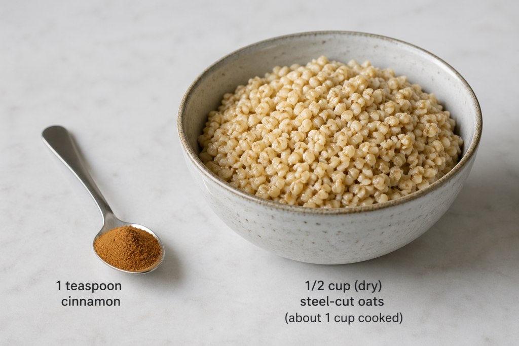 A teaspoon of cinnamon beside a bowl of steel-cut oats, illustrating a simple and healthy daily portion size