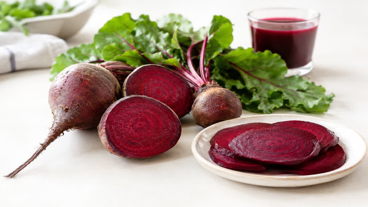 Fresh whole and sliced beetroot served as part of an everyday healthy diet.