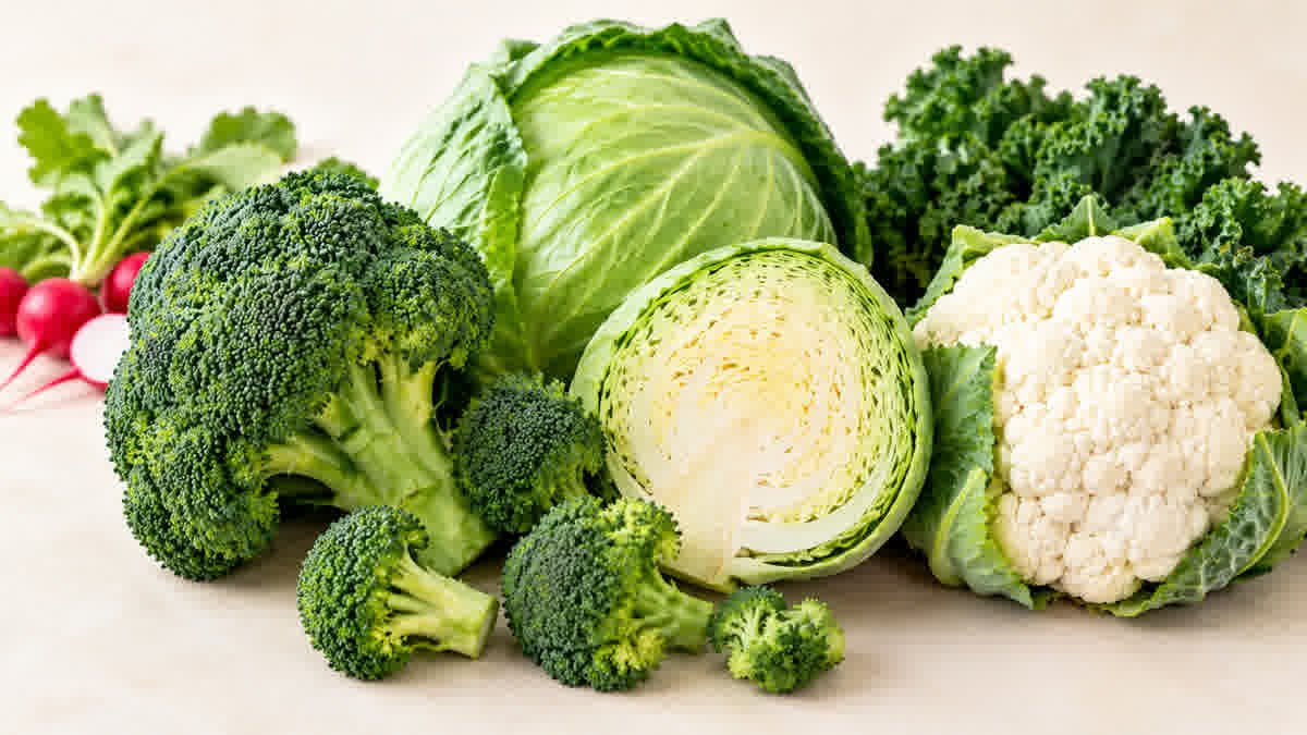 Fresh broccoli, green cabbage, and cauliflower arranged together