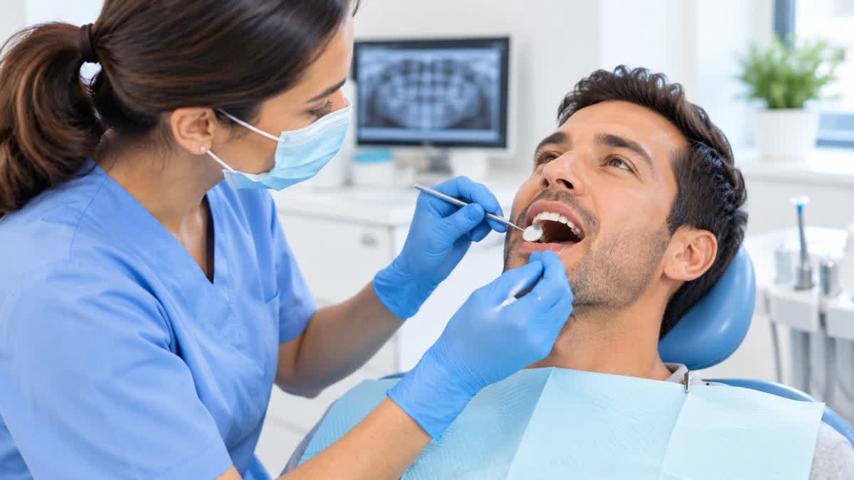 Dentist examining a patient's mouth during an oral health assessment