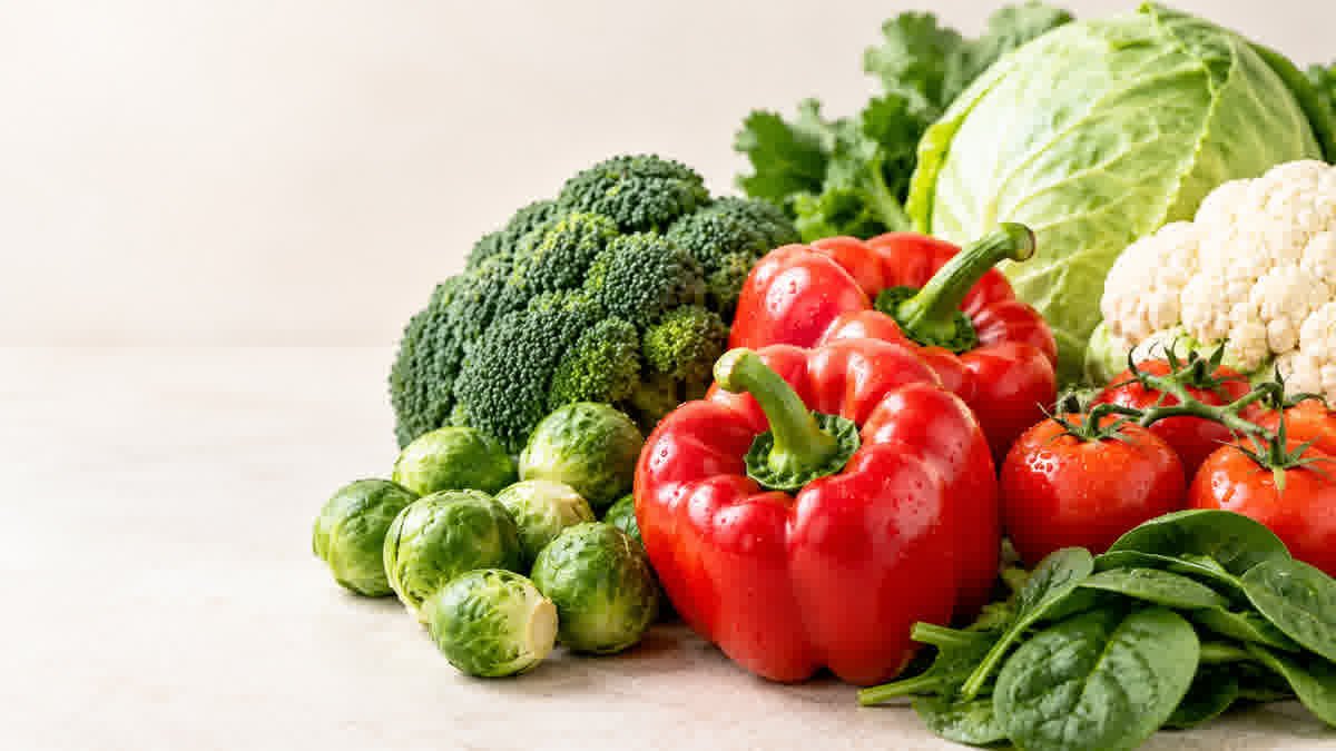 Fresh red bell peppers, broccoli, Brussels sprouts, cauliflower, and other vegetables high in vitamin C.